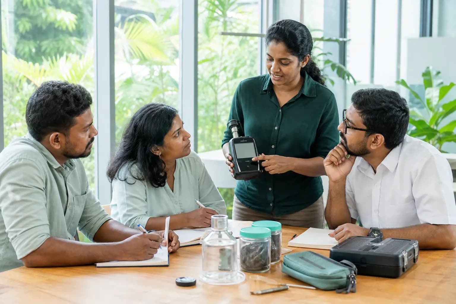 Environmental scientist leading a practical sustainability training session